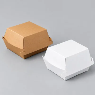 Custom burger boxes in kraft and white cardboard with a practical folding design for takeaway food packaging.